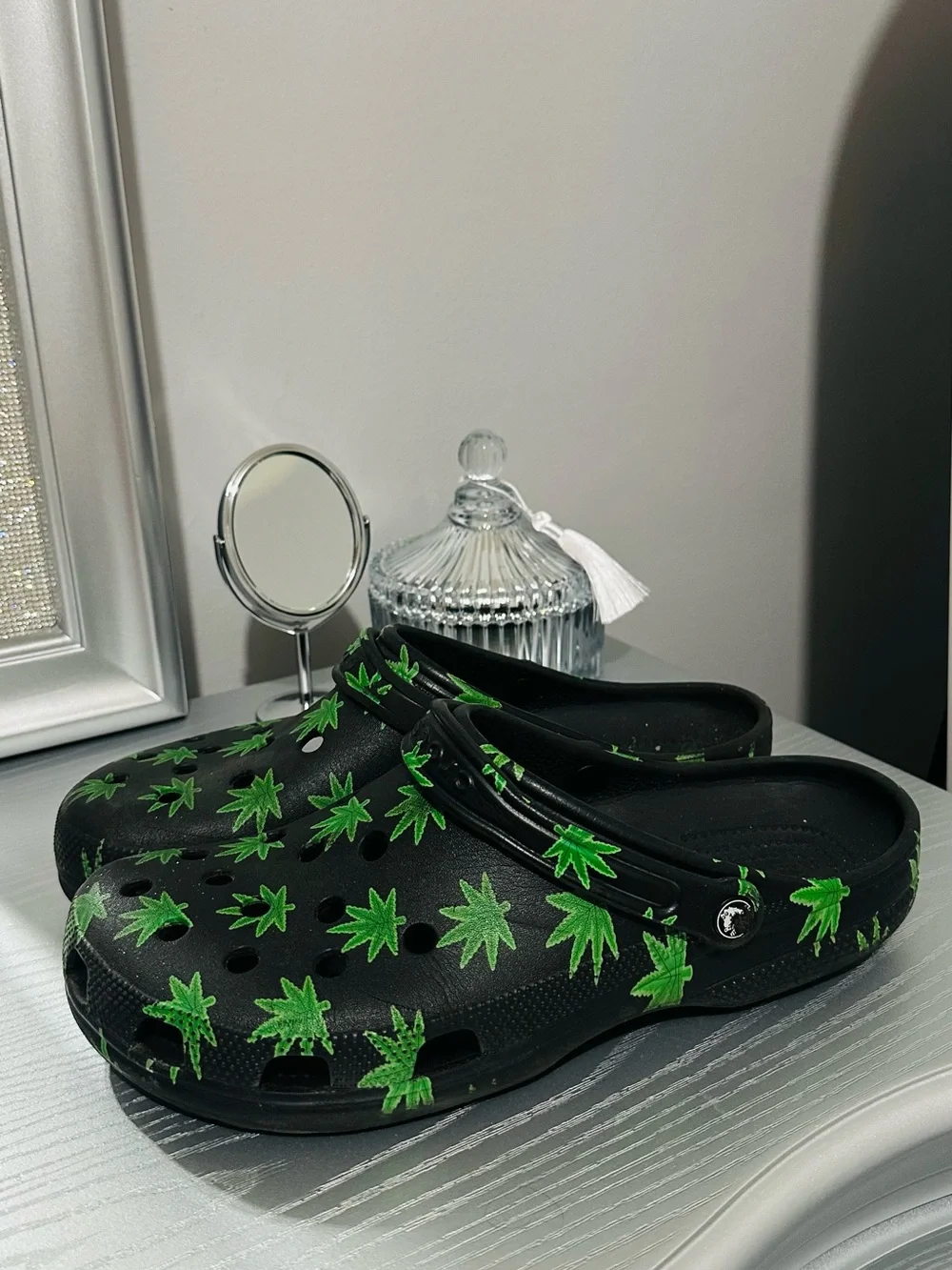 CROCS Black Slip-On Clogs with Green Leaf Print